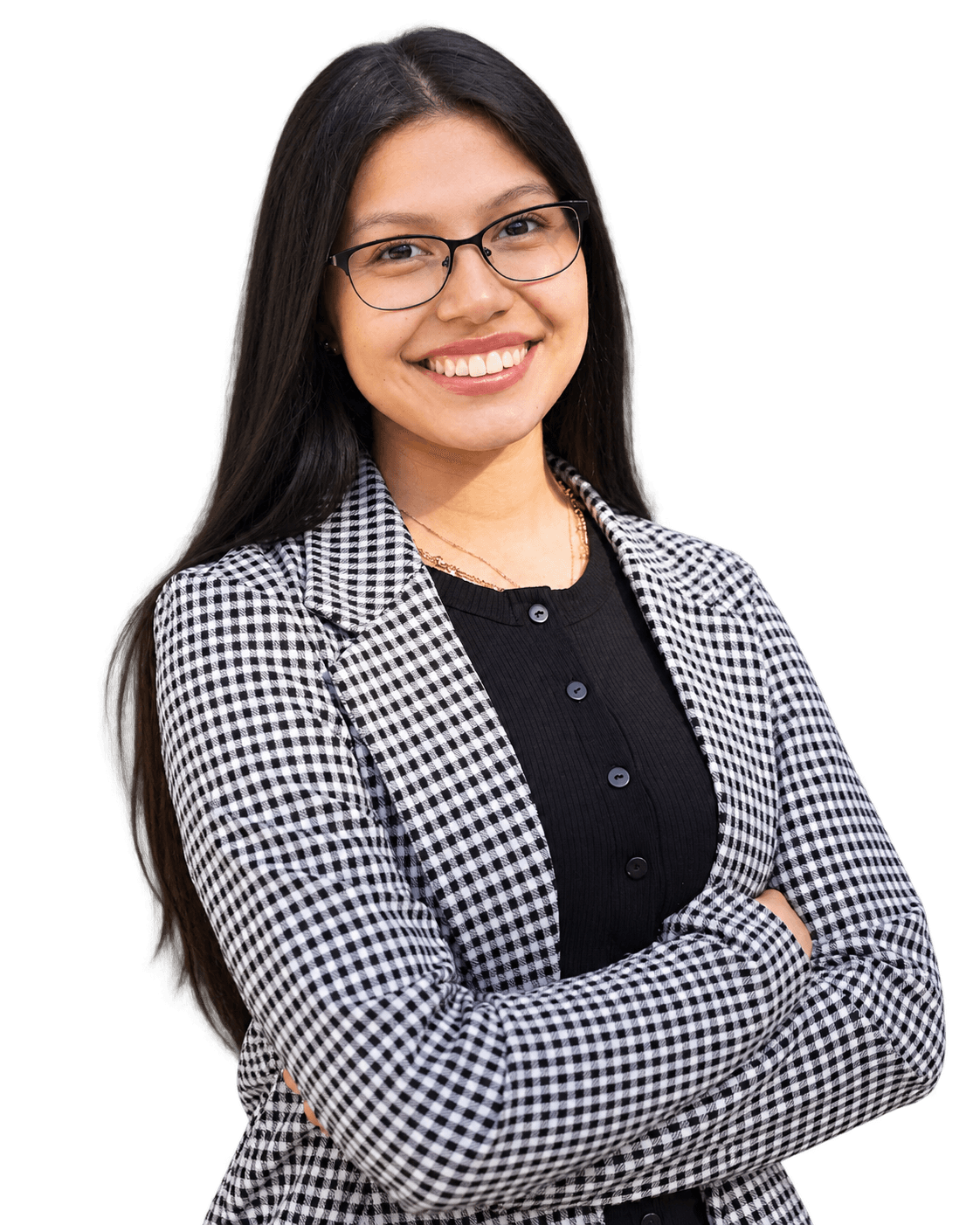 Andrea Naranjo smiling in glasses and a black-and-white blazer